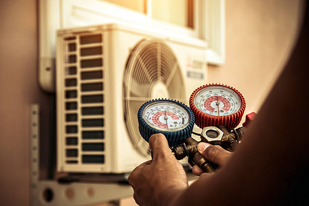 Professional Ductwork Repair technician working in Dinuba, CA